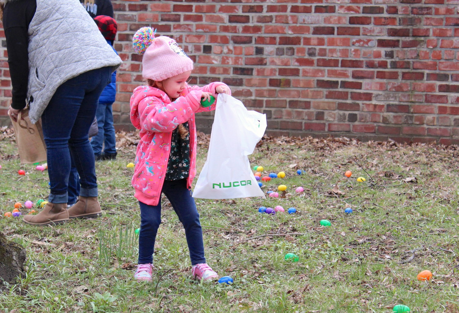 Willow Koontz, 4, bags another Easter egg Saturday at the General Lew Wallace Study.